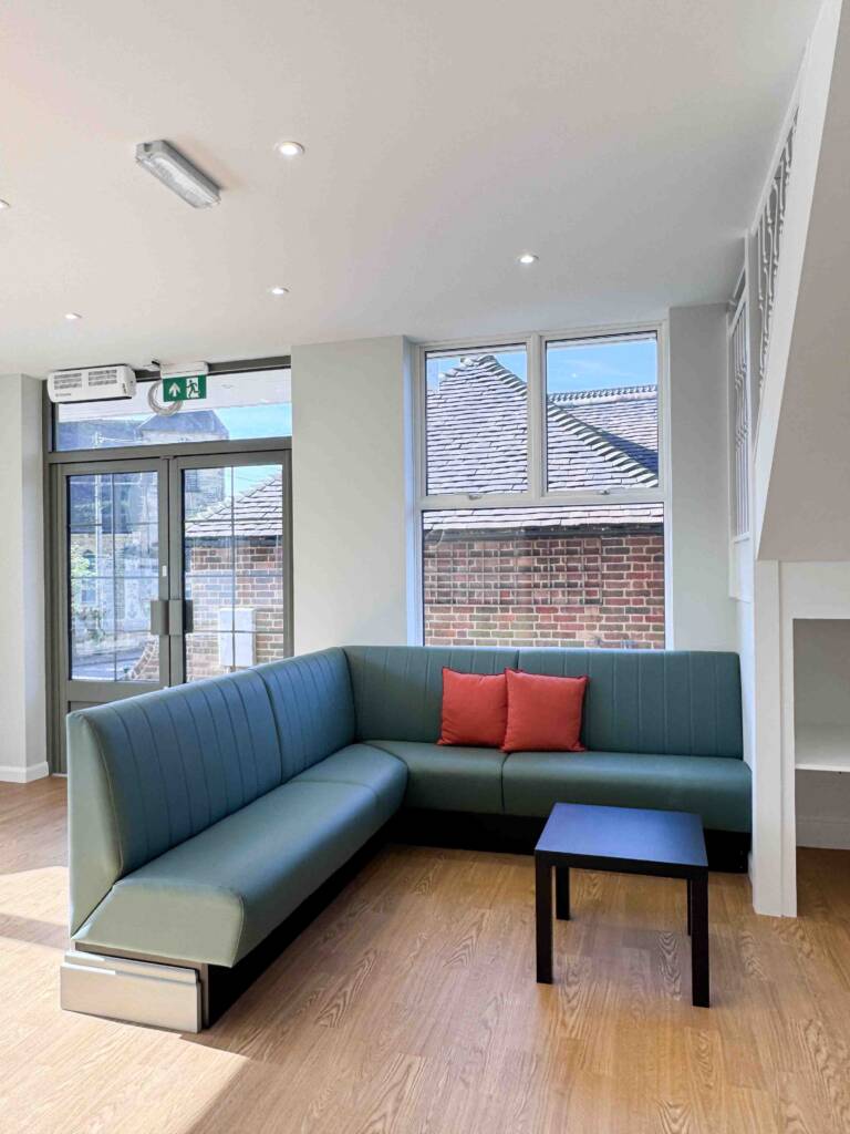 Haslemere Vets waiting area with sofa and table